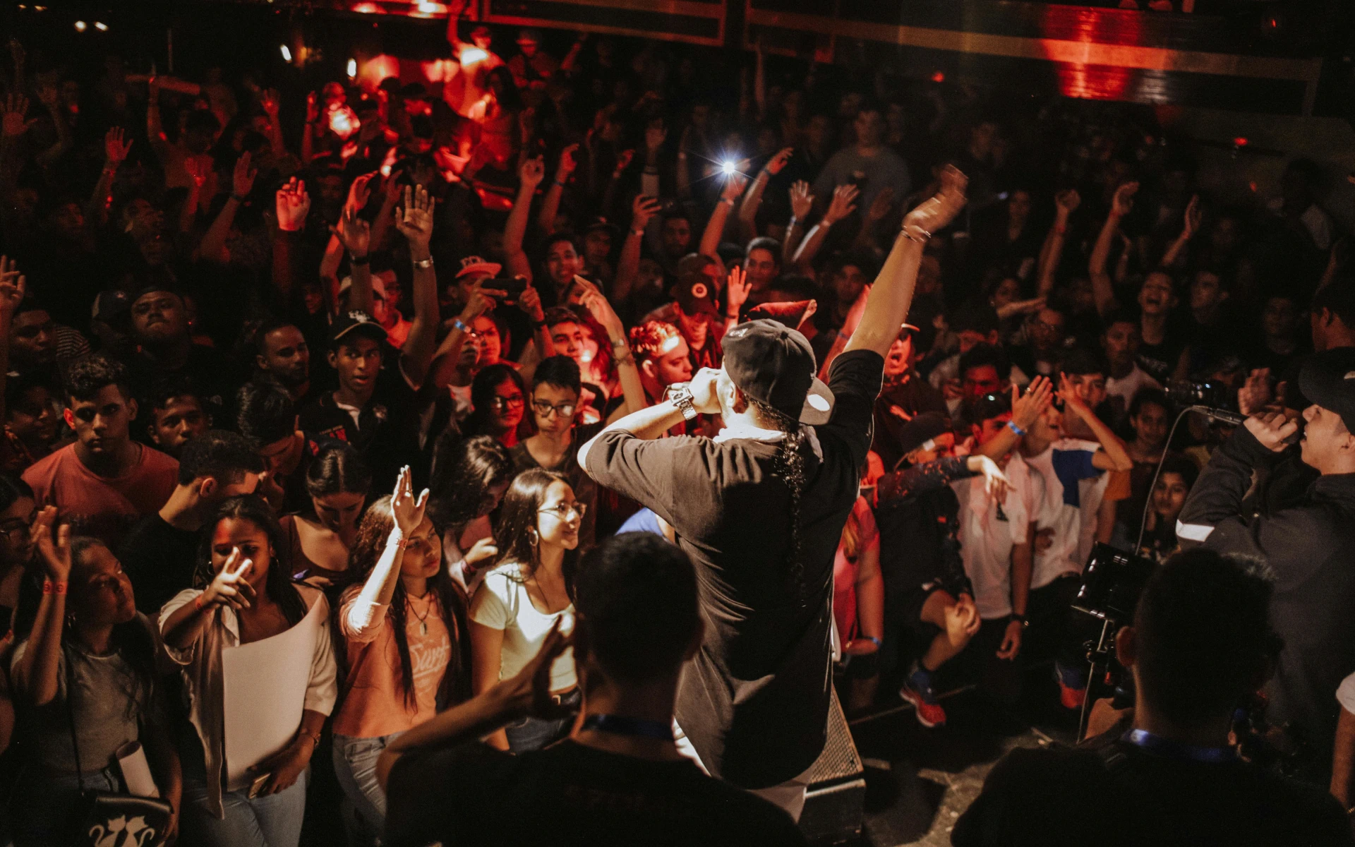A band performing in front of a crowd